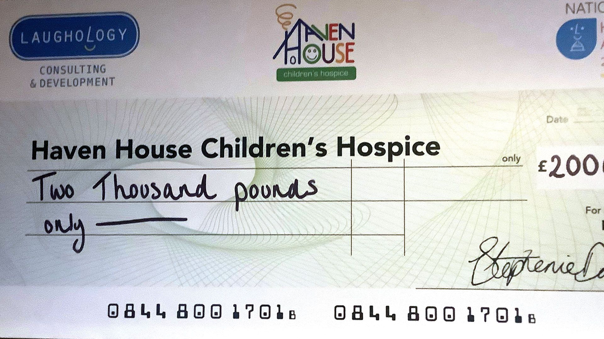 Haven House happinees awards cheque