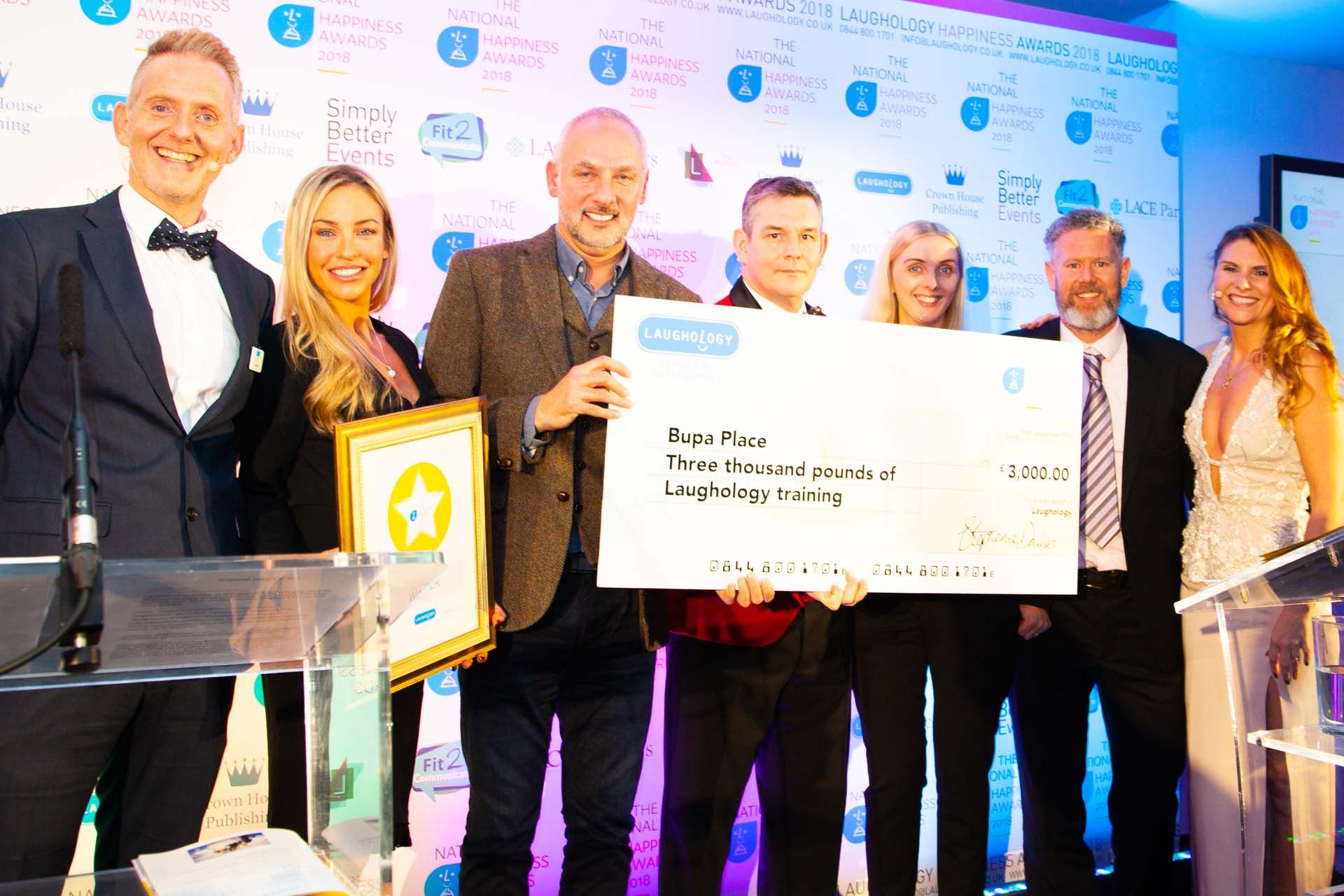 BUPA place receiving their happiness award