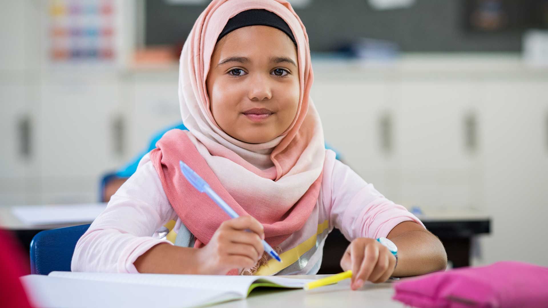 muslim schoolgirl doing Laughology PSHE lesson
